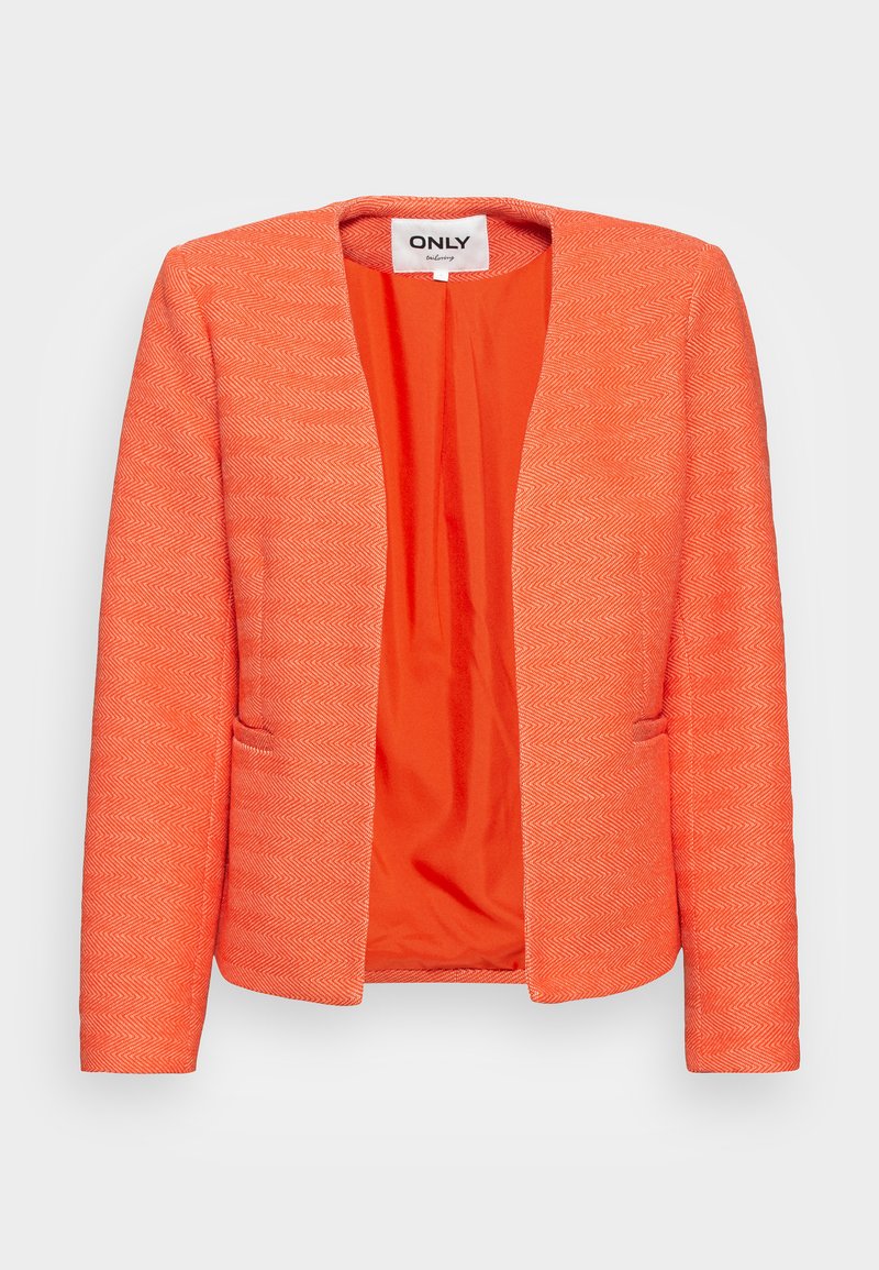 Veste orange avec un motif en chevrons texturé, à l'avant ouvert et deux poches latérales. Doublée d'un intérieur orange uni.