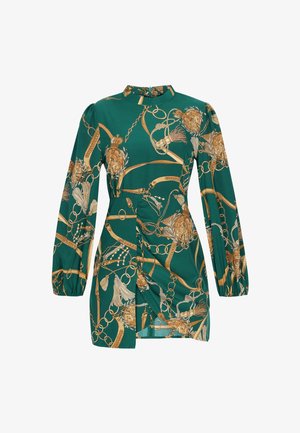 Grünes Mini-Kleid mit langen Ärmeln, verziert mit goldenen Ketten-, Quasten- und Seilmustern, Taillenraffung und hohem Ausschnitt mit Reißverschluss hinten.