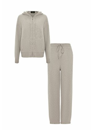 Light gray loungewear set featuring a zip-up hoodie with ribbed cuffs and matching drawstring pants with elastic waistband and ribbed hems.
