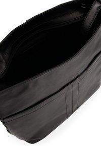 Black leather bag with a smooth texture, zippered closure, and interior pocket. Features a logo and multiple exterior sections.