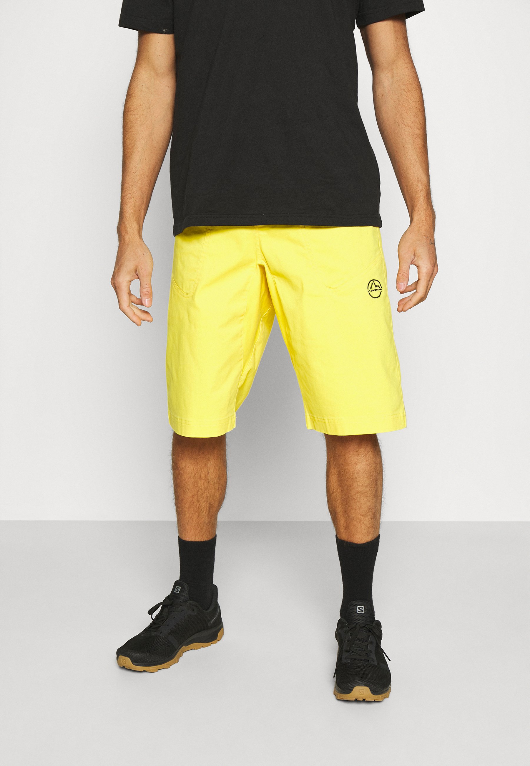 black and yellow shorts