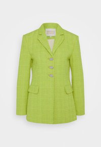 Limoengroene tweed blazer met een gelapte revers, drie zilveren knoopsluitingen en twee voorzakken. Getextureerde stof met een gestructureerde pasvorm.