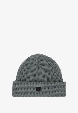 Gray knitted beanie hat with a ribbed cuff, featuring a textured pattern and a small black emblem on the front.