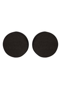 Paire de sous-verres ronds, noirs, avec une surface texturée. Bords lisses et profil plat. Convient à différentes surfaces de table.
