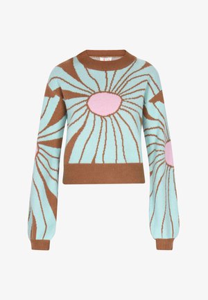 Knit-pusero vaaleansinisenä, jossa on ruskeita ja vaaleanpunaisia kukkakuvioita. Varressa ja helmassa ribbitekstiä. Lyhyt malli, pehmeä tuntuma, rento istuvuus.