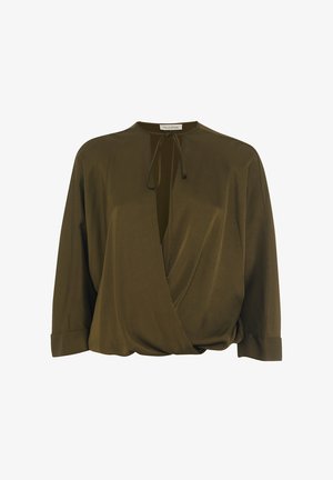 Olive green wrap blouse with a tie closure at the neckline, long sleeves, and a soft, smooth texture. Features a deep v-neck design.