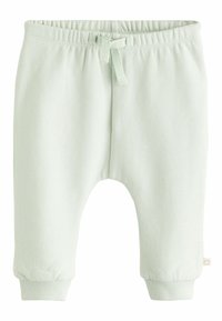 Lysgrønne sweatpants lavet af blødt bomuldsstof, elastisk talje med dekorativ snor, tætsiddende ben med fitted afslutninger, uden synlige mønstre.