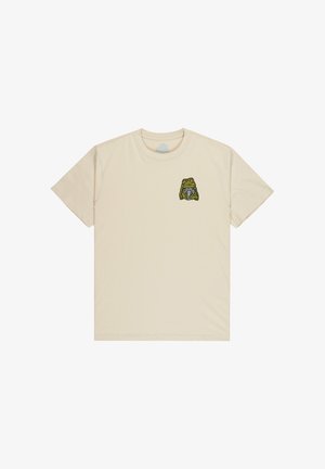 Bézs pamut rövid ujjú póló, zöld béka grafikával a bal mellrészen. Egyszerű, kerek nyakkivágás, puha tapintású anyag.
