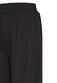 Pantalon de jogging noir léger avec une taille élastique, doté de poches latérales et d'une texture lisse. Design simple avec peu de détails.