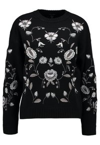 Pull noir en maille avec broderie florale blanche et grise sur le devant et les manches, avec poignets et ourlet côtelés.