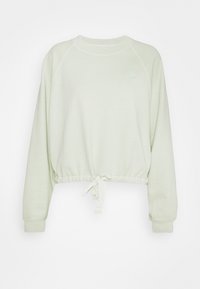 Ljusgrön kort sweatshirt med långa raglanärmar, elastisk midja och snöre. Har subtil brodering av logotypen på bröstet.