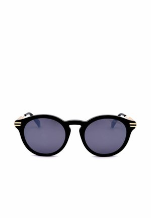 Occhiali da sole rotondi neri con lenti scure e dettagli dorati sulle cerniere, mostrati su uno sfondo bianco.