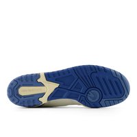 Blue and cream rubber shoe sole features multi-directional treads, textured surface, and "new balance" branding etched in.
