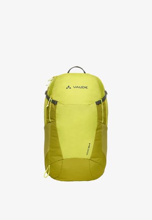 Mochila de senderismo compacta de color amarillo verdoso con compartimentos con cremallera, bolsillos laterales de malla, asa superior y la marca "VAUDE Wizard 24+4".