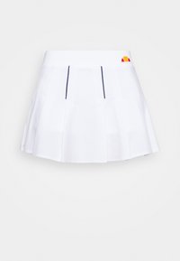 Falda blanca plisada con una textura suave, detalles en azul marino y un pequeño logo de colores en la cinturilla.