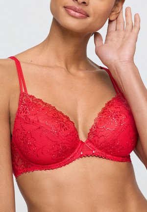 Roter Spitzen-BH mit floralen Mustern, durchsichtigem Stoff, verstellbaren Trägern und einem gewellten Saum entlang der Cups und des Bands.