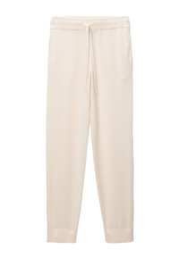 Pantalons de jogging beige clair en tissu doux. Comprenant une taille élastique avec cordon de serrage, des poches latérales et des poignets côtelés à la cheville.
