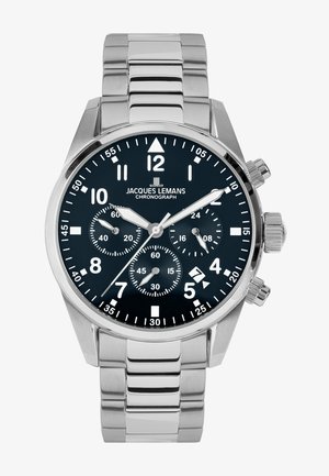 Edelstahl-Chronographenuhr mit schwarzem Zifferblatt, leuchtenden Stundenmarkierungen und drei Hilfszifferblättern. Verfügt über ein Metallarmband und eine Standardkrone.