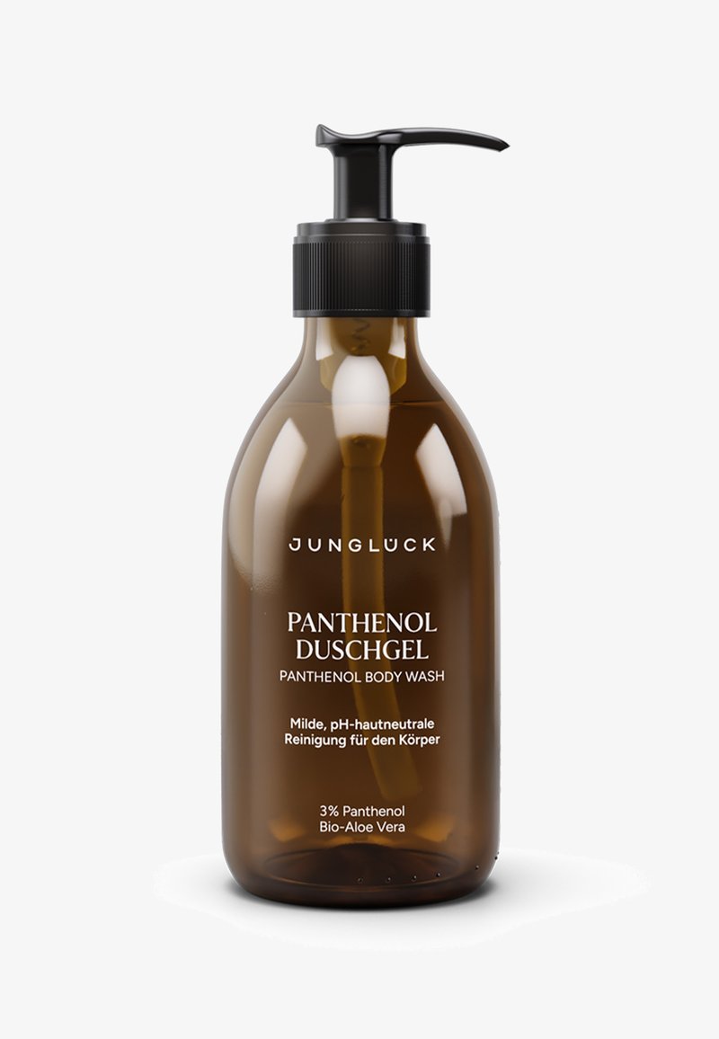 Braune Glasflasche mit schwarzem Pumpverschluss, beschriftet mit „JUNGLUCK Panthenol Duschgel“. Enthält 3 % Panthenol und Bio-Aloe Vera.
