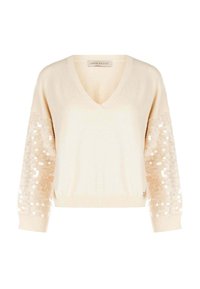 Maglione beige lavorato a maglia con scollo a V, con maniche testurizzate decorate con paillettes. Polsini e orlo a coste completano il design.