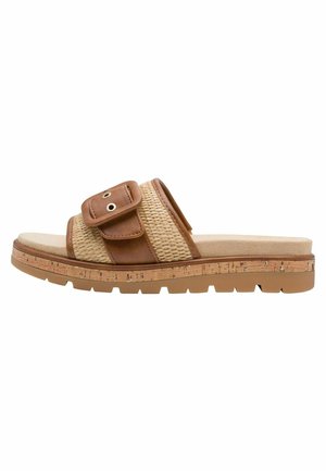 Sandale à glissière marron avec une tige tissée, deux accents circulaires en métal, et une semelle légère en liège avec un motif antidérapant texturé.
