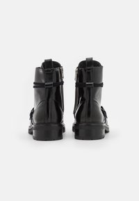 AllSaints Stivaletti stringati - black