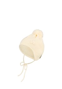 Cream knitted baby hat with ear flaps, a pom-pom on top, floral detail on the side, and tied strings underneath.