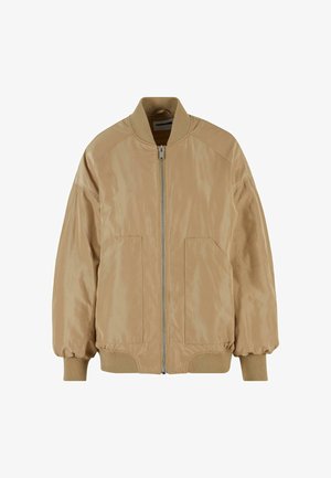 Gaiši brūns bomber jakas ar gludu, spīdīgu apdari. Satur priekšējo rāvējslēdzēju, ribotas piedurknes un apakšdaļu, kā arī divas sānu kabatas.