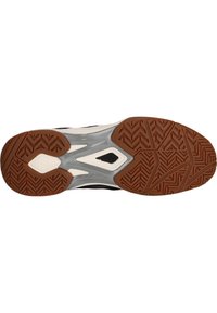 Sko sula med en mönstrad brun gummiyta och en vit, formad mellansula. Har en grå detalj och ett multidirektionellt mönster.