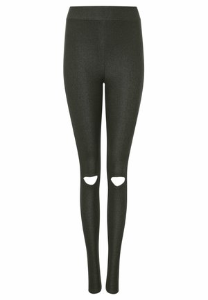 Zwarte, rekbare legging met een hoge tailleband en twee uitsparingen bij de knieën. Soepele textuur met een subtiele glans. Slanke pasvorm.