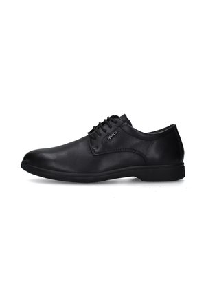 Scarpa da donna in pelle nera con finitura liscia, punta tonda, design allacciato e dettagli di cucitura minimi. Suola in gomma per una maggiore aderenza.