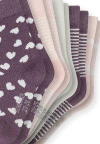 Set of eight socks in varying shades of purple, pink, and gray. Features include heart patterns, stripes, and polka dots, with ribbed cuffs.