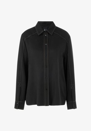 Black button-up shirt with contrasting beige stitching, long sleeves, a pointed collar, and square cuff accents. Features a relaxed fit.