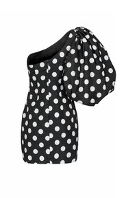 Abito mini nero con pois bianchi, una spallina scoperta e una manica a sbuffo oversize sul lato destro.