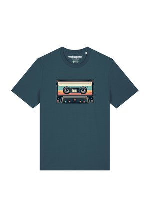 Dark teal t-shirt with a retro cassette tape graphic featuring multicolored stripes, round buttons, and intricate detailing on the cassette.