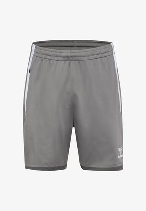 Pantaloni sportivi grigi realizzati in un tessuto leggero, con una superficie testurizzata, vita elastica e strisce laterali bianche. Logo Hummel esposto.