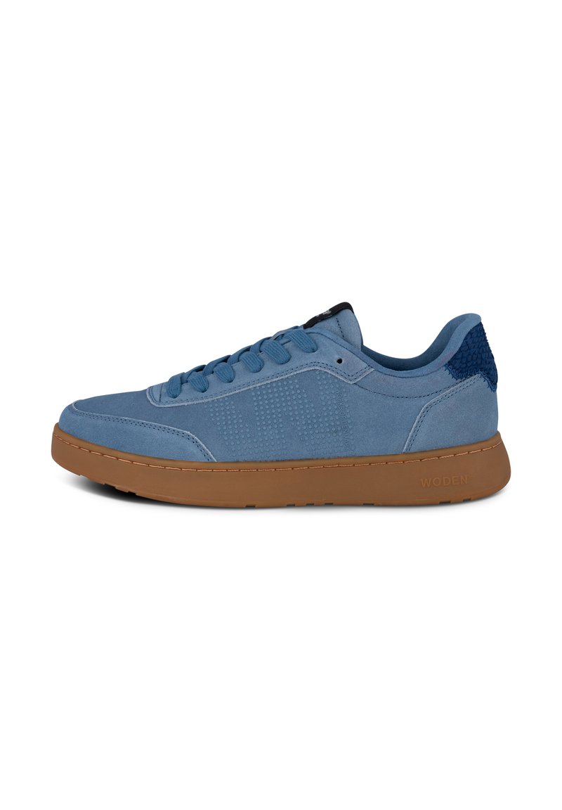 Blue suede sneaker with round toe, light perforated design, flat brown rubber sole, textured heel accent, and flat leather laces.