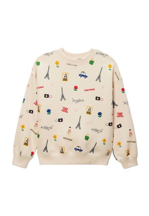 Sweat-shirt crème avec des imprimés colorés sur le thème de Paris, comprenant des tours Eiffel, des avions, des appareils photo, des fleurs, des taxis, ainsi que des textes comme "Bienvenue" et "Welcome".
