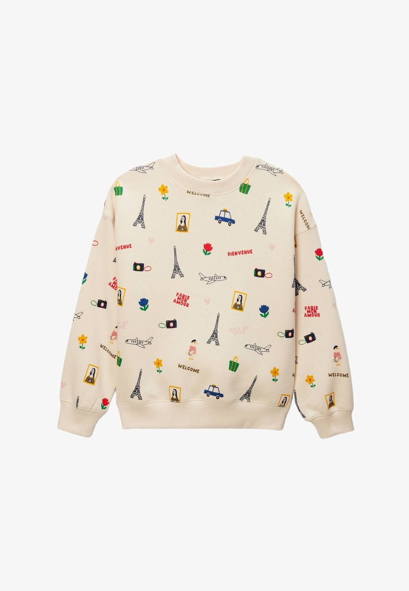 Sweat-shirt crème avec des imprimés colorés sur le thème de Paris, comprenant des tours Eiffel, des avions, des appareils photo, des fleurs, des taxis, ainsi que des textes comme "Bienvenue" et "Welcome".