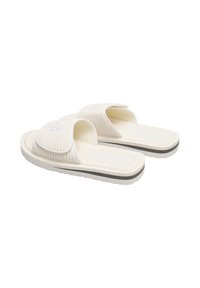White slide sandals with ribbed strap design, textured footbed, and a grey accent along the sole. Lightweight material, open-toe style.