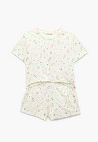 Cremefarbenes kurzärmliges Hemd und Shorts-Set mit rosa Schleifen und kleinem Blumenmuster, flach auf einem weißen Hintergrund ausgelegt.