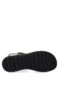 Schwarze Gummisohlen-Sandalen mit strukturierten Profilmustern, ausgestattet mit grünen Wildlederriemen für einen sicheren Sitz und einem neutralen Design.