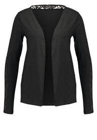 Cardigan noir à manches longues, ouvert sur le devant, avec des détails en dentelle le long des manches et du bord du col, confectionné en tissu léger.