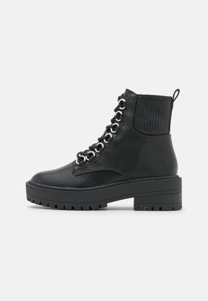 Botines con plataforma - black