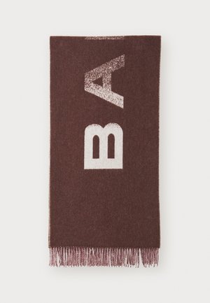Brown wool blend scarf featuring white bold lettering. Ends are trimmed with long, matching brown fringes. Soft texture, rectangular shape.