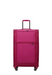 Pink rolling suitcase with a hard exterior, a telescopic handle, and four wheels. Features a front zippered pocket and logo detail.