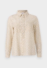 Long-sleeve shirt in a light beige fabric, featuring a repetitive brown polka dot pattern, a collared neck, and button-down front.