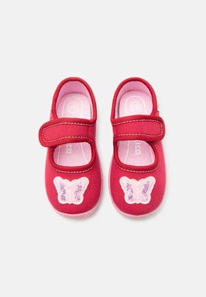 Red toddler shoes with pink insoles, hook-and-loop straps, and decorative pink butterfly patches on the toes.