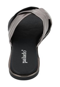 Black and metallic slide sandal with crossed straps. Textured insole, stable sole, and subtle branding on the footbed.