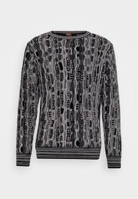 Schwarzer und grauer Pullover mit einem strukturierten, gestreiften Muster, rundem Ausschnitt und gerippten Bündchen und Saum. Glattes Material mit weichem Finish.